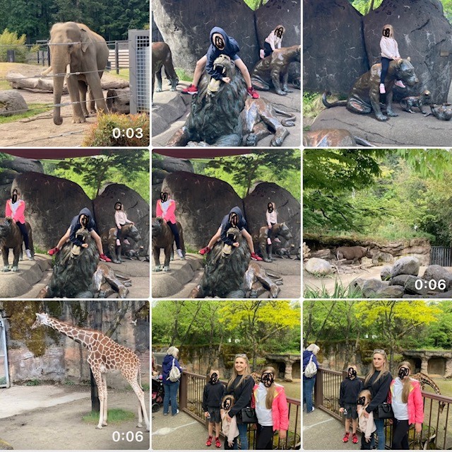 A mom laughing at the zoo with her kids